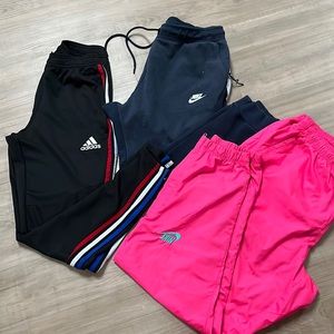 Three pairs of joggers, two Nike one adidas!